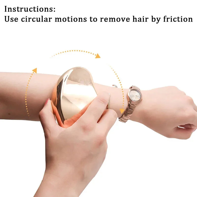 Hand using gold hair removal tool with circular motion on arm