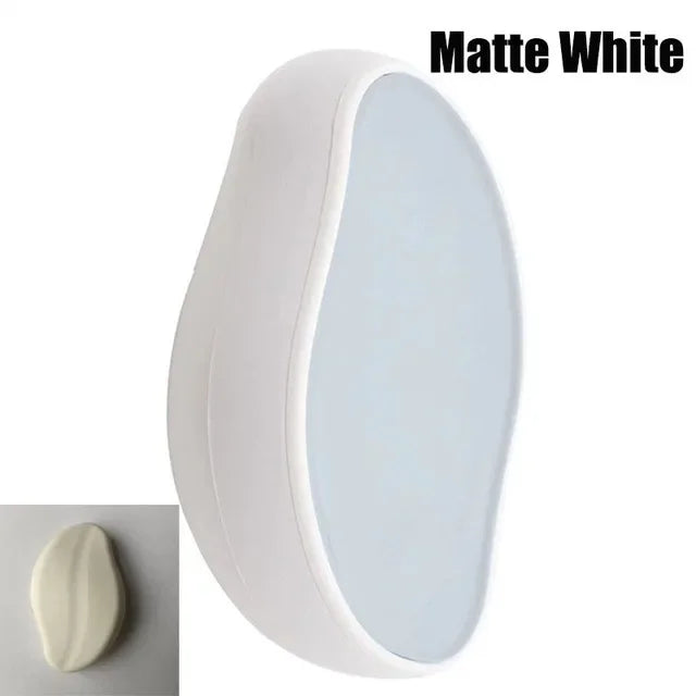 Matte white oval wall mirror with sleek modern design