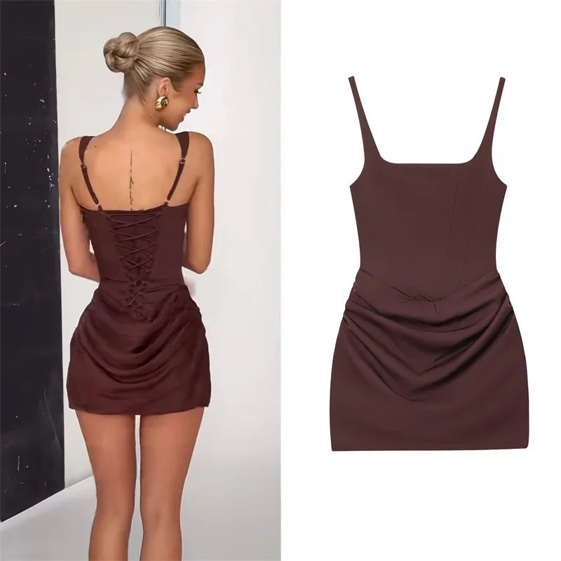 Brown lace-up back mini dress with ruched detailing and thin straps