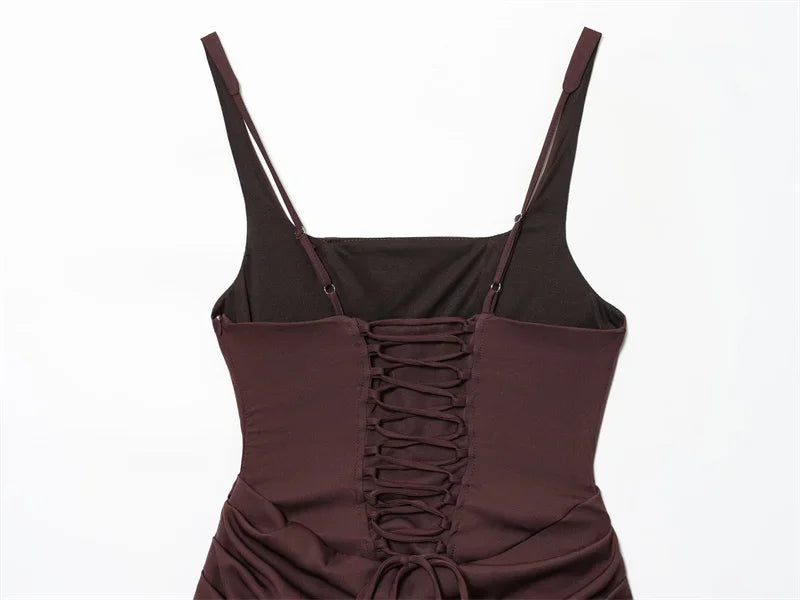 Dark brown lace-up back dress with thin straps and ruched detailing